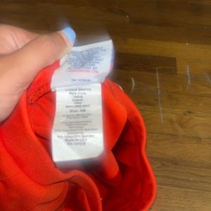 Orange Tailgate Cheerleading skirt. Size adult Medium